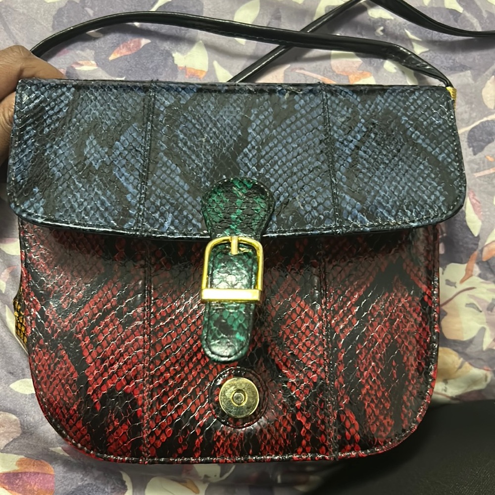 Snake skin faux leather crossbody purse.
